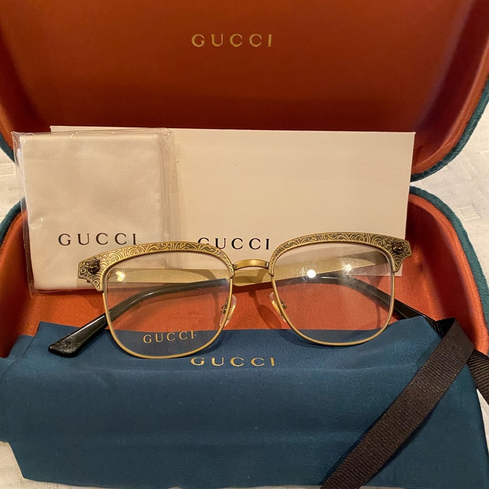 Gucci gold frame glasses